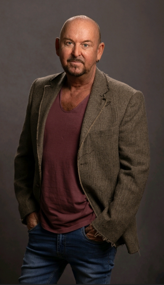 Steve sitting on a chair